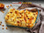 Budincă dulce cu brânză și stafide - FoodNation - Mancare proaspat gatita la oala
